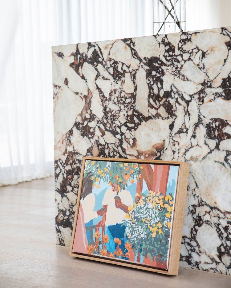 Paint Like Frida Tea in the Afternoon big framed canvas paint by numbers placed in a custom wooden frame for extra accent