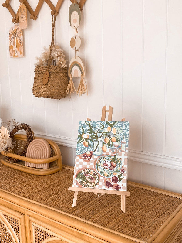 Completed Paint Like Frida Sunday Squeeze mini framed canvas in an easel as a decoration