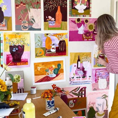 A photo of Crystal Knight's paintings