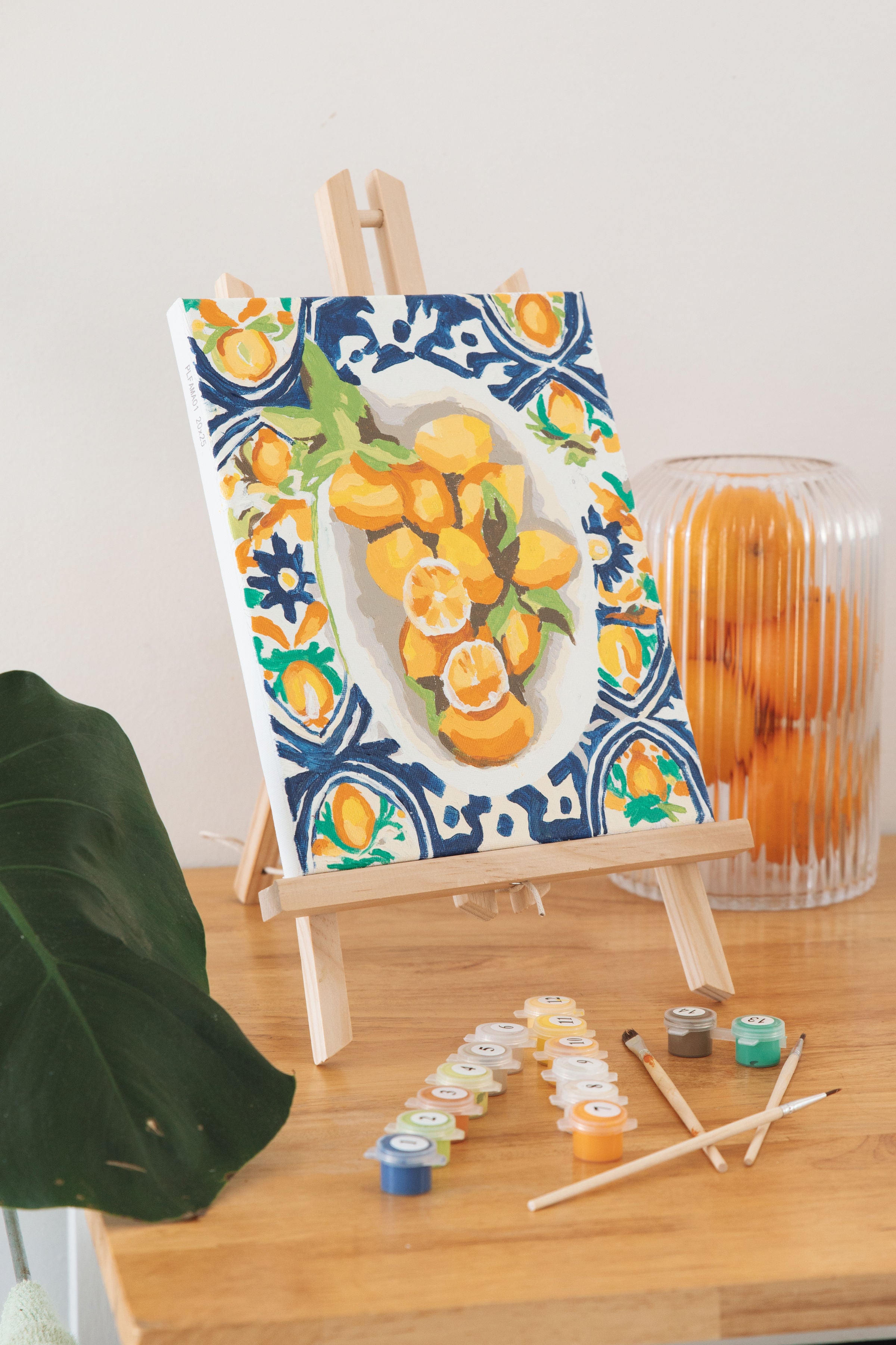 Mini Amalfi Lemons kit sitting on the Mini Easel on a table