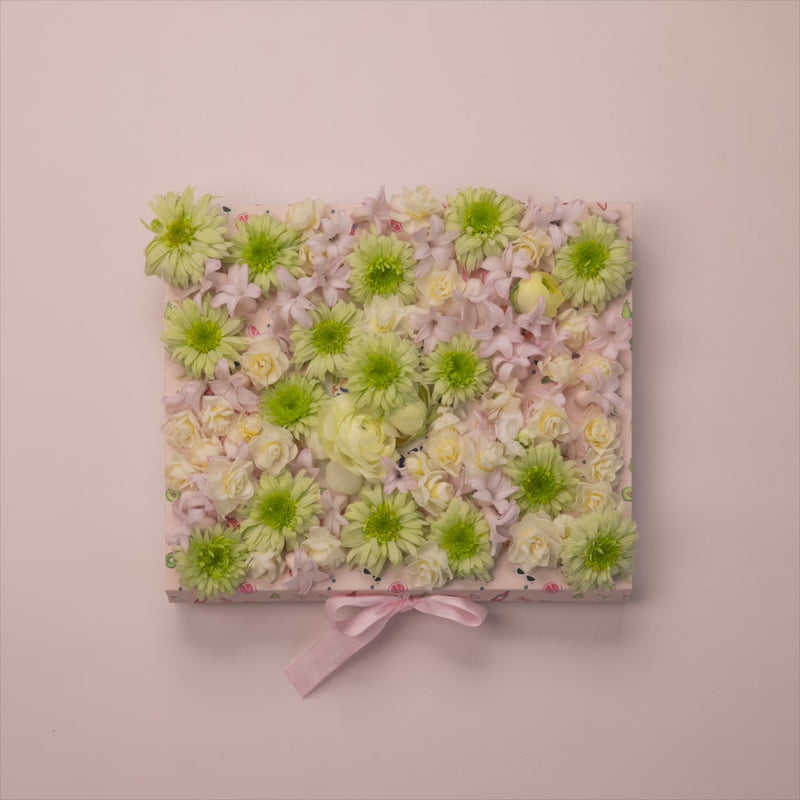 a video of Paint Like Frida boxes with flowers moving 