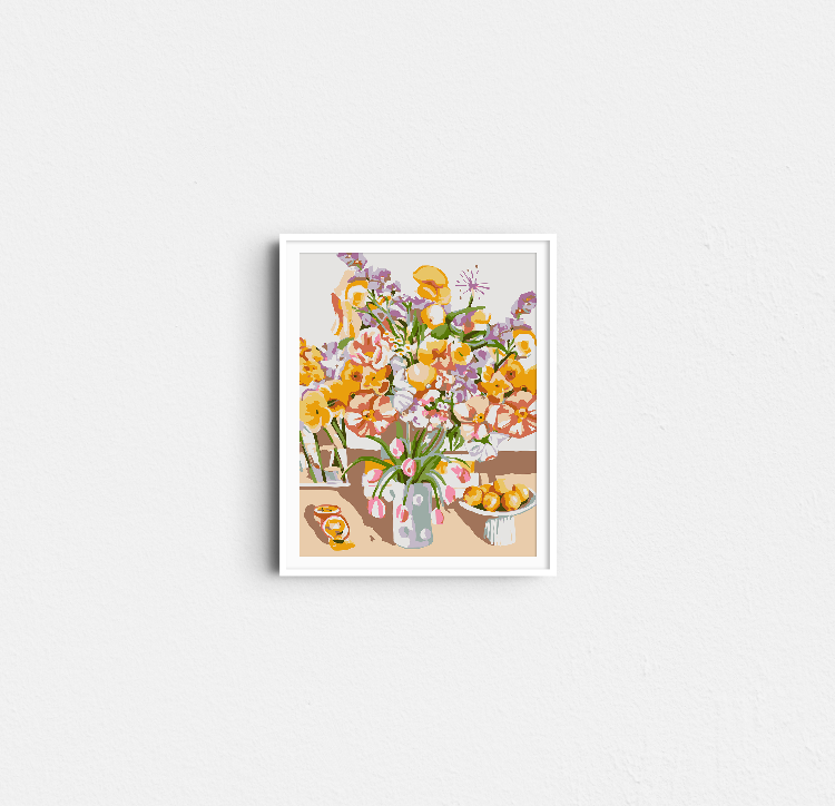 Completed Paint Like Frida Birthday Flowers mini rolled canvas painting in white frame hanging on the wall.