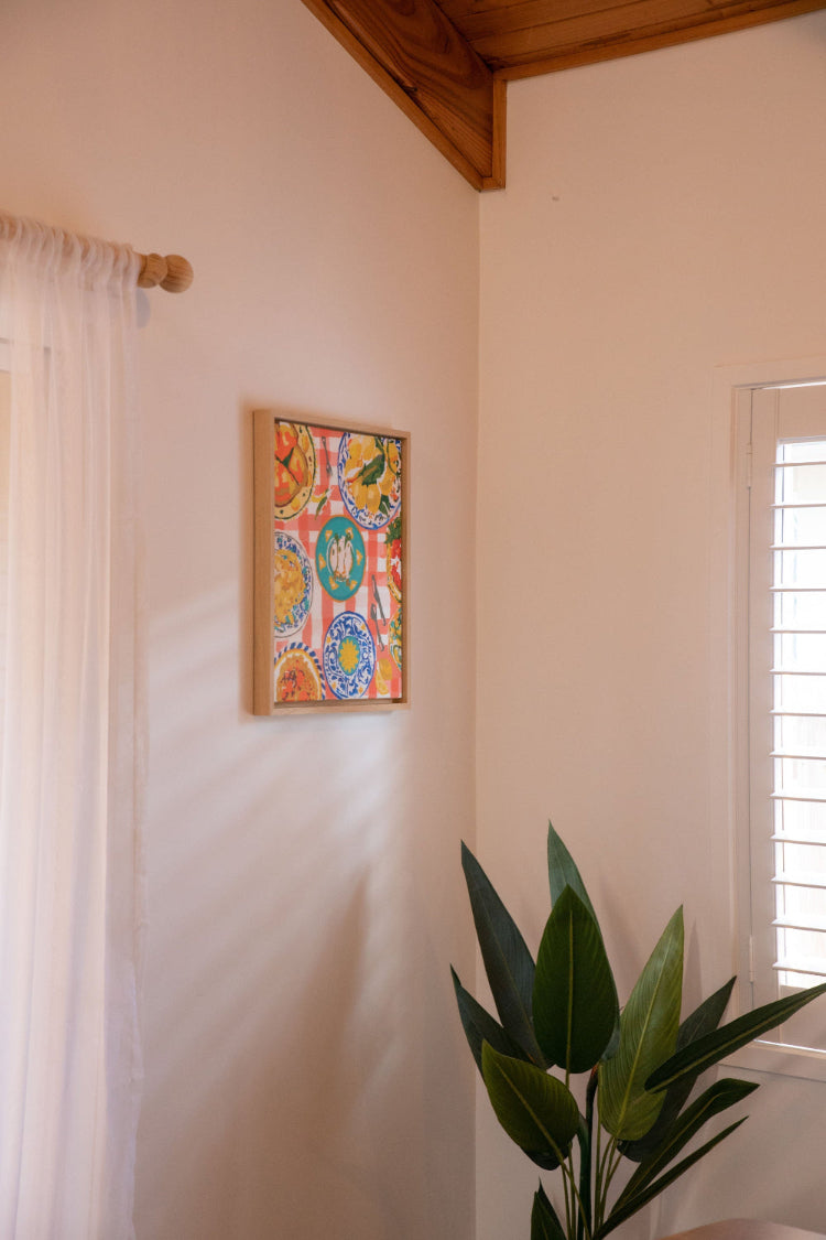Completed Paint Like Frida Nonna’s House big framed canvas painting hanging on the wall.