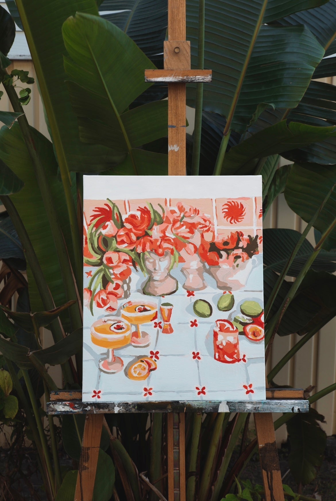 Paint Like Frida finished Summer Fridays painting in an easel